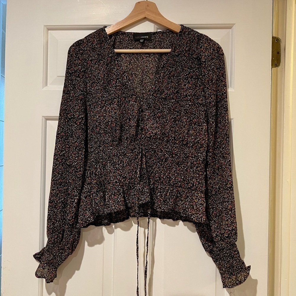 Lucy Paris floral top with waist detail.
